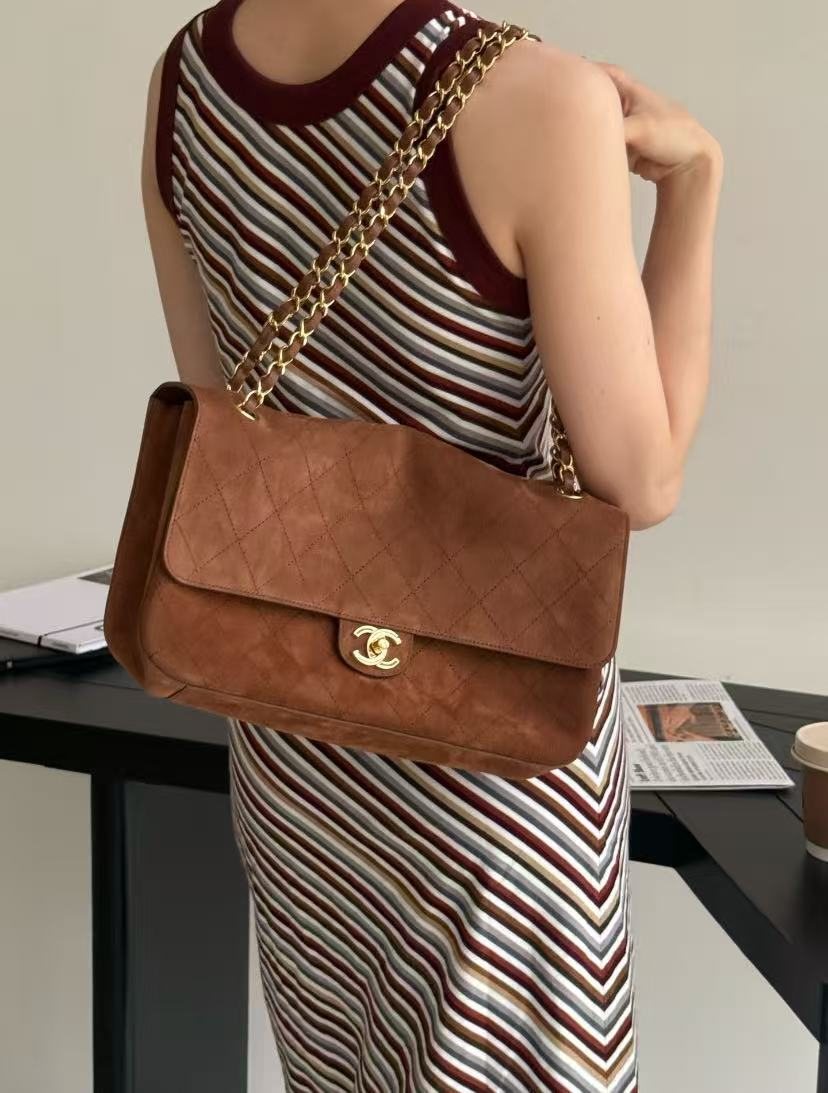Chanel Maxi Flap Quilted Shoulder Bag — model