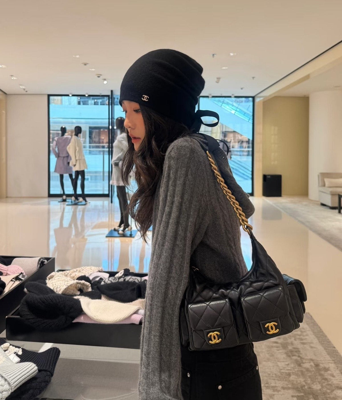 Chanel 25 Quilted Hobo Shoulder Bag — model