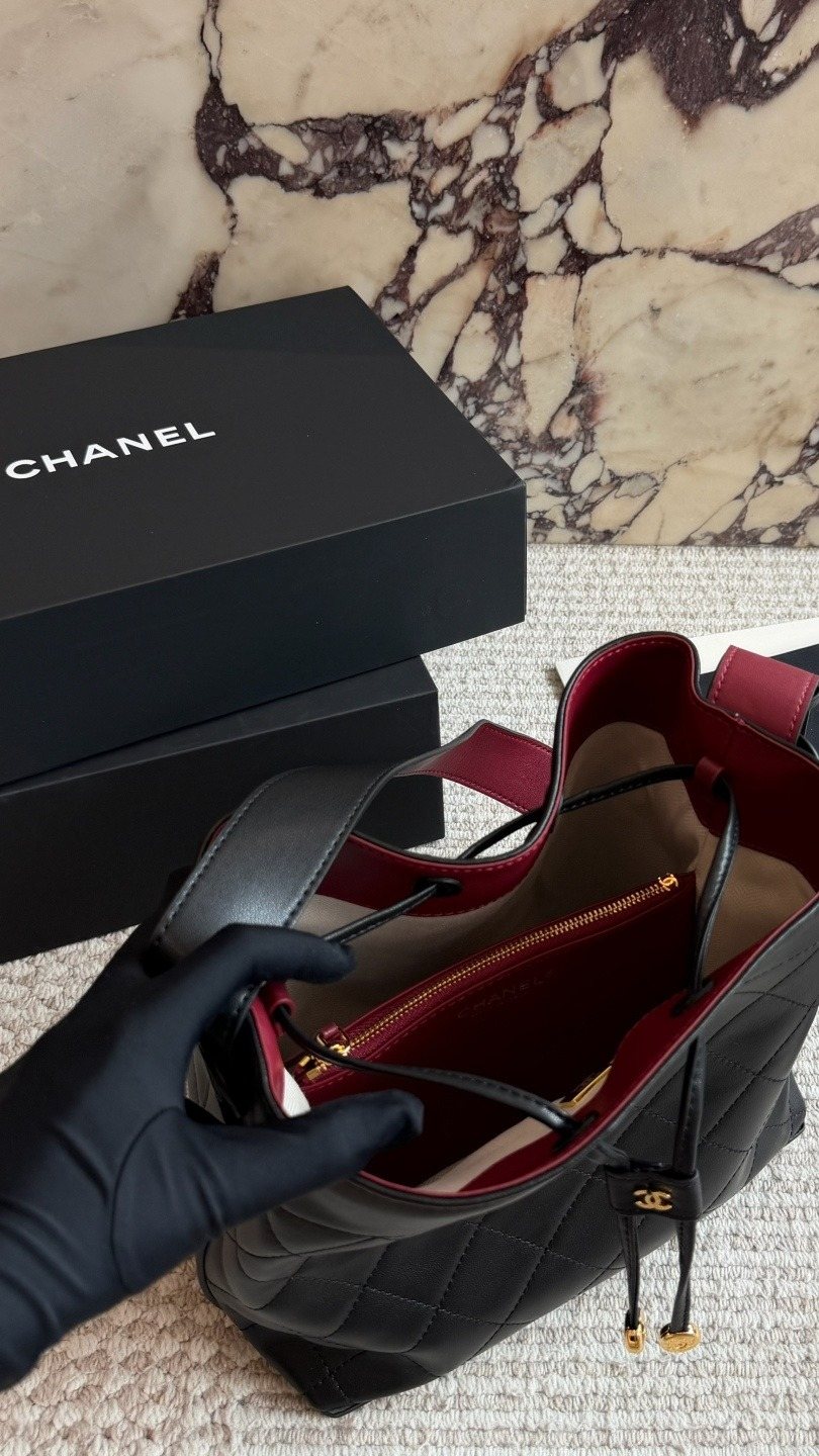 Chanel Diamond-Quilted Drawstring Bucket Bag — detail