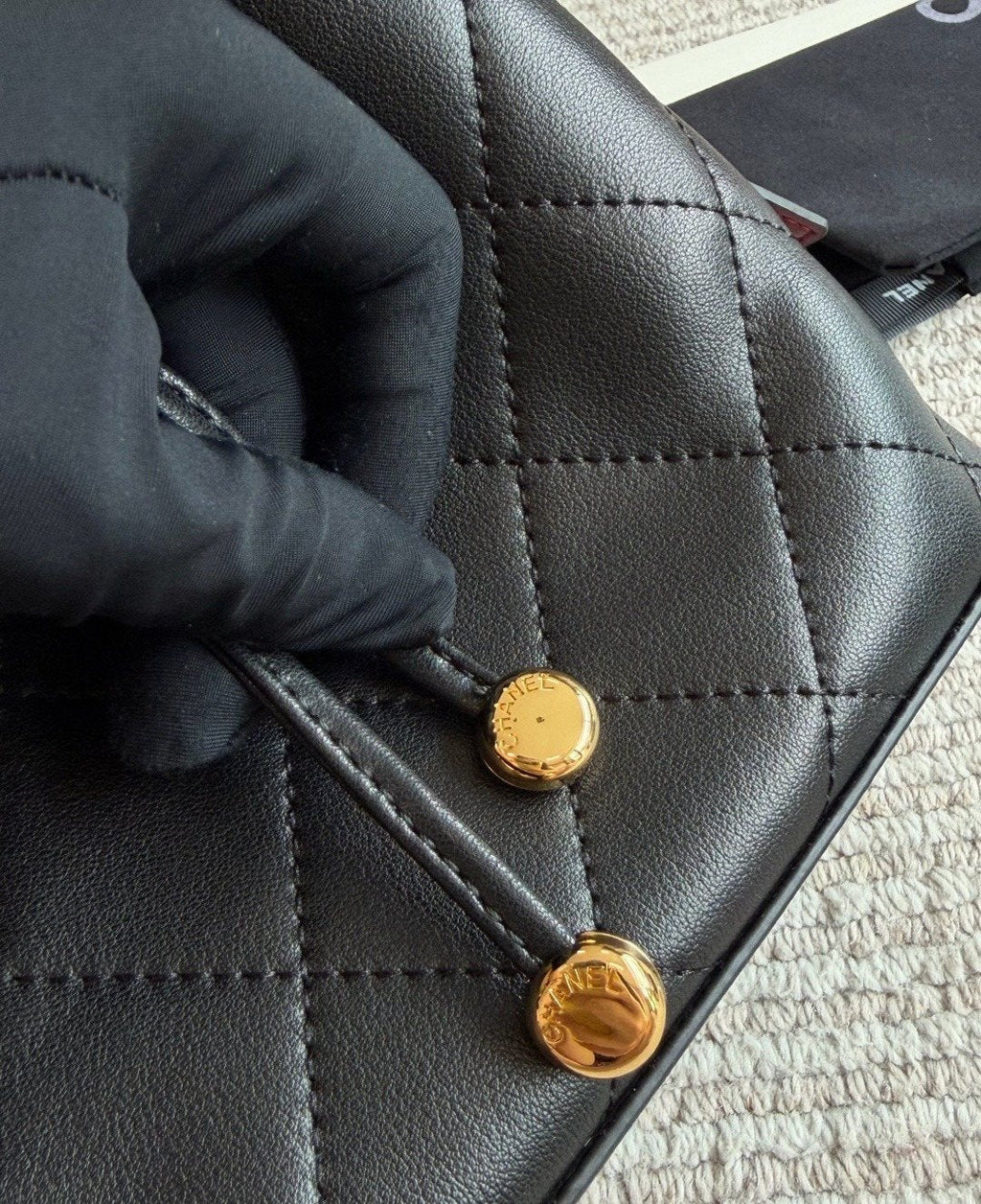 Chanel Diamond-Quilted Drawstring Bucket Bag — detail